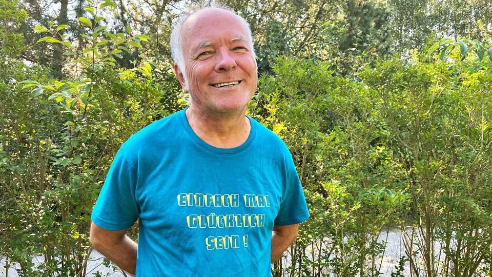 Porträt von Jörg Gebauer im Grünen