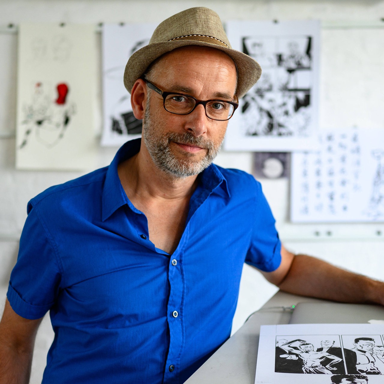 Comiczeichner Reinhard Kleist in seinem Studio