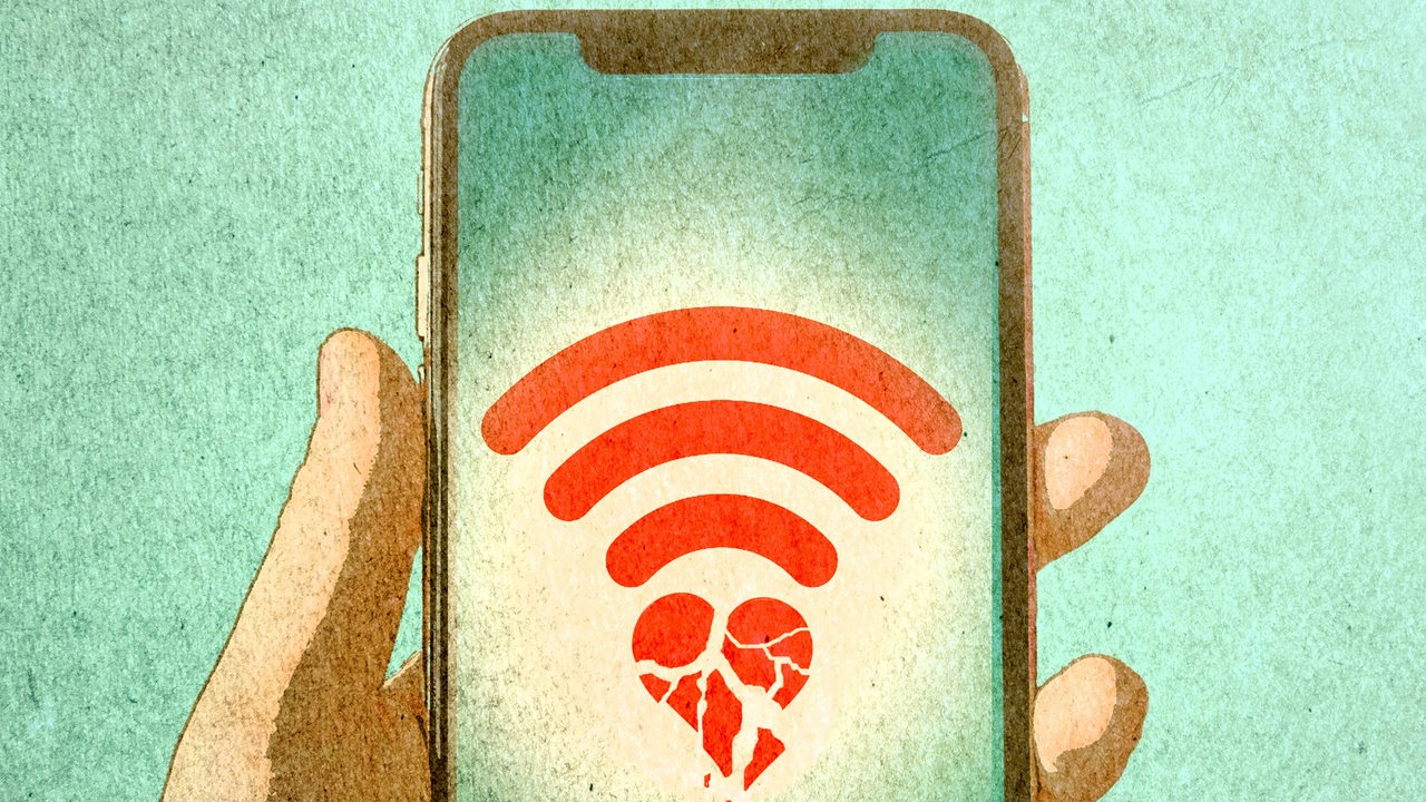 Grafik zeigt eine Hand, die ein Mobiltelefon mit zerbrochenem Herz und Funkwellen zeigt